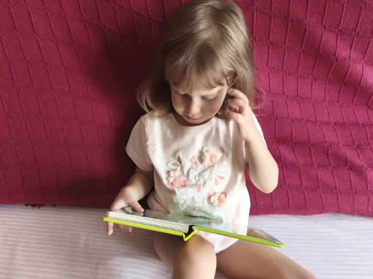 toddler reading a book
